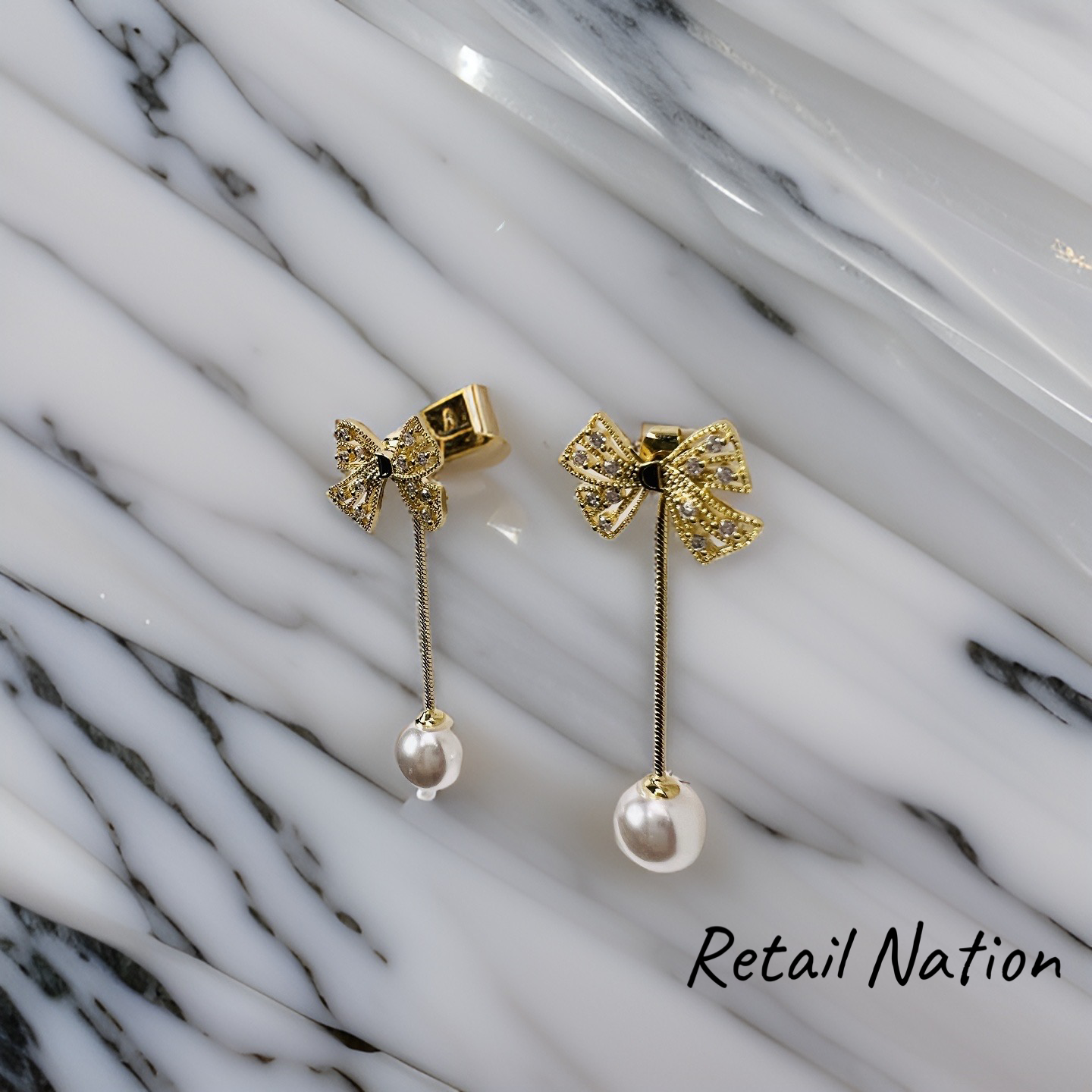 Ribbon Pearl Tassel Earrings